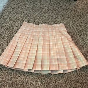 pink pleated skirt